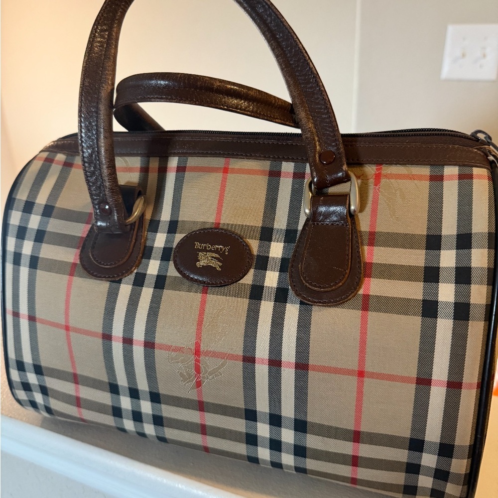 vintage Burberry Boston bag featuring the iconic Haymarket bag